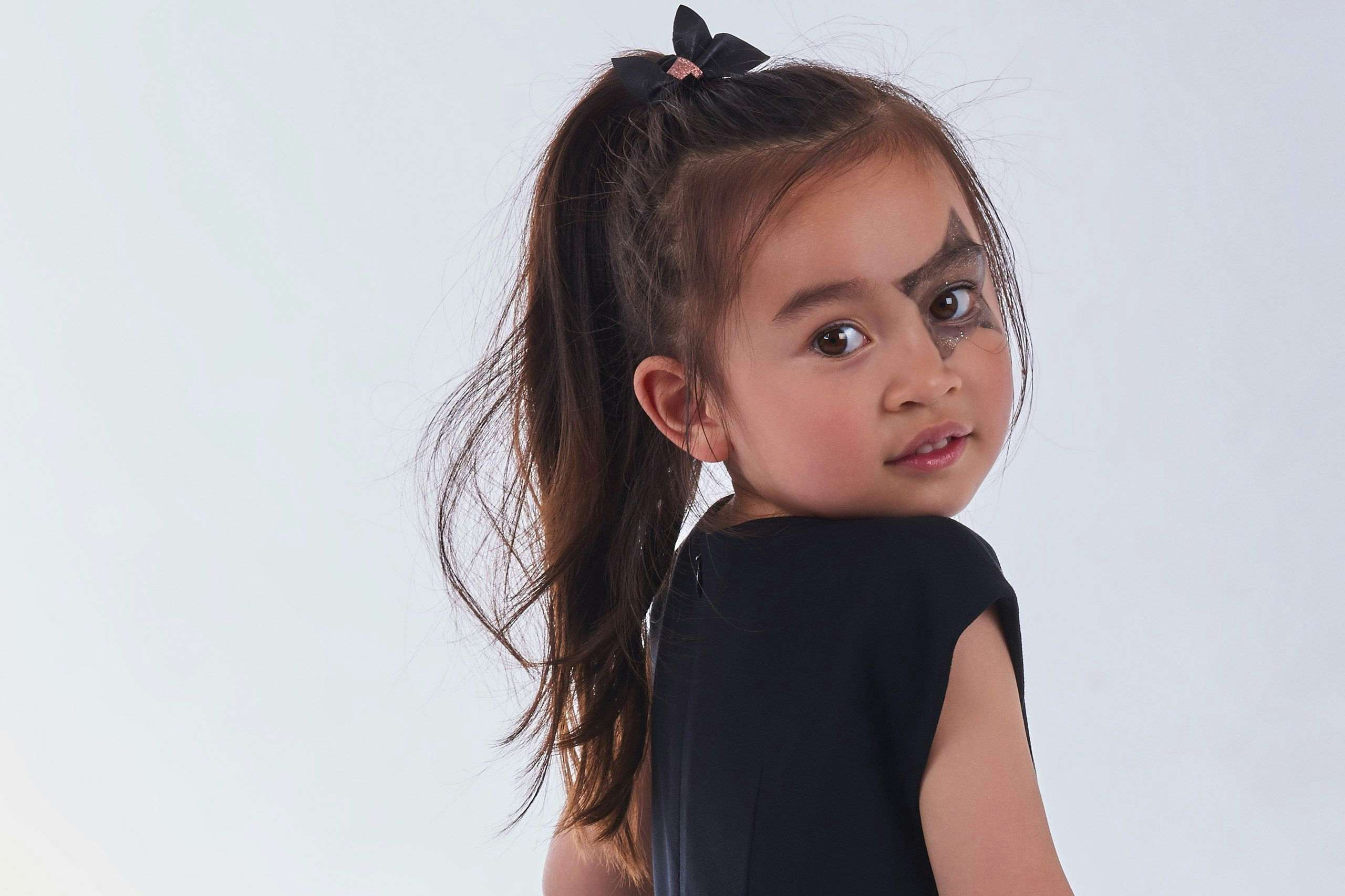Model Kathleen wearing a Marese Couture dress for BigBen Kids. Photography by Xavier Wendling.