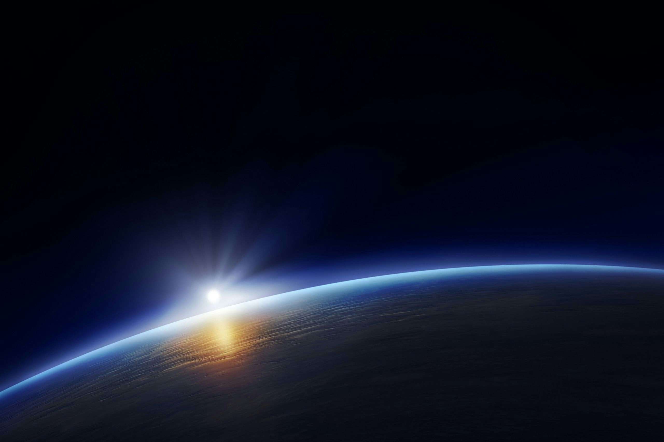 Space view of sun rising over the earth to illustrate my daily logo design challenge